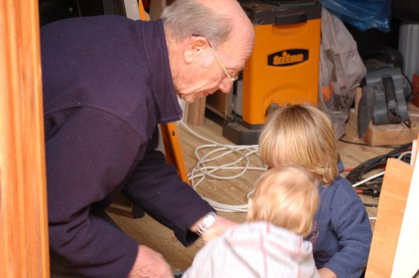 Bruce Hedenskog teaching his grandson's to build their own Owl's House using the step-by-step assembly.